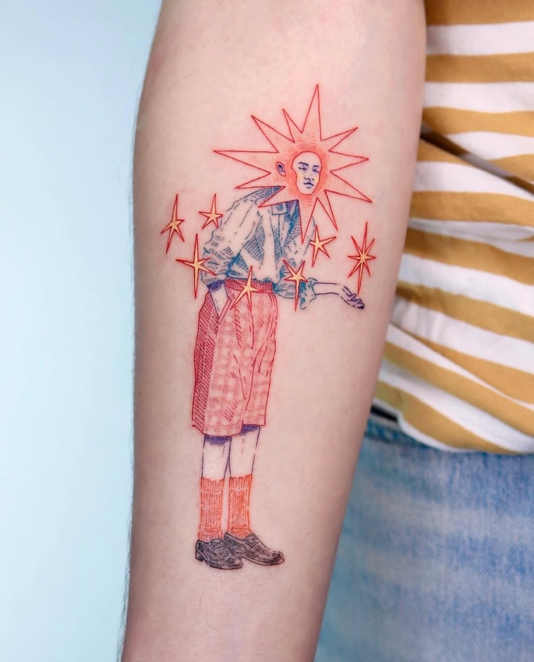 Whimsical character tattoo with vibrant star details Tattoo Design