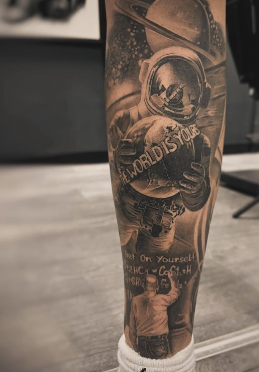 Astronaut Drifting Through the Cosmos Tattoo Design