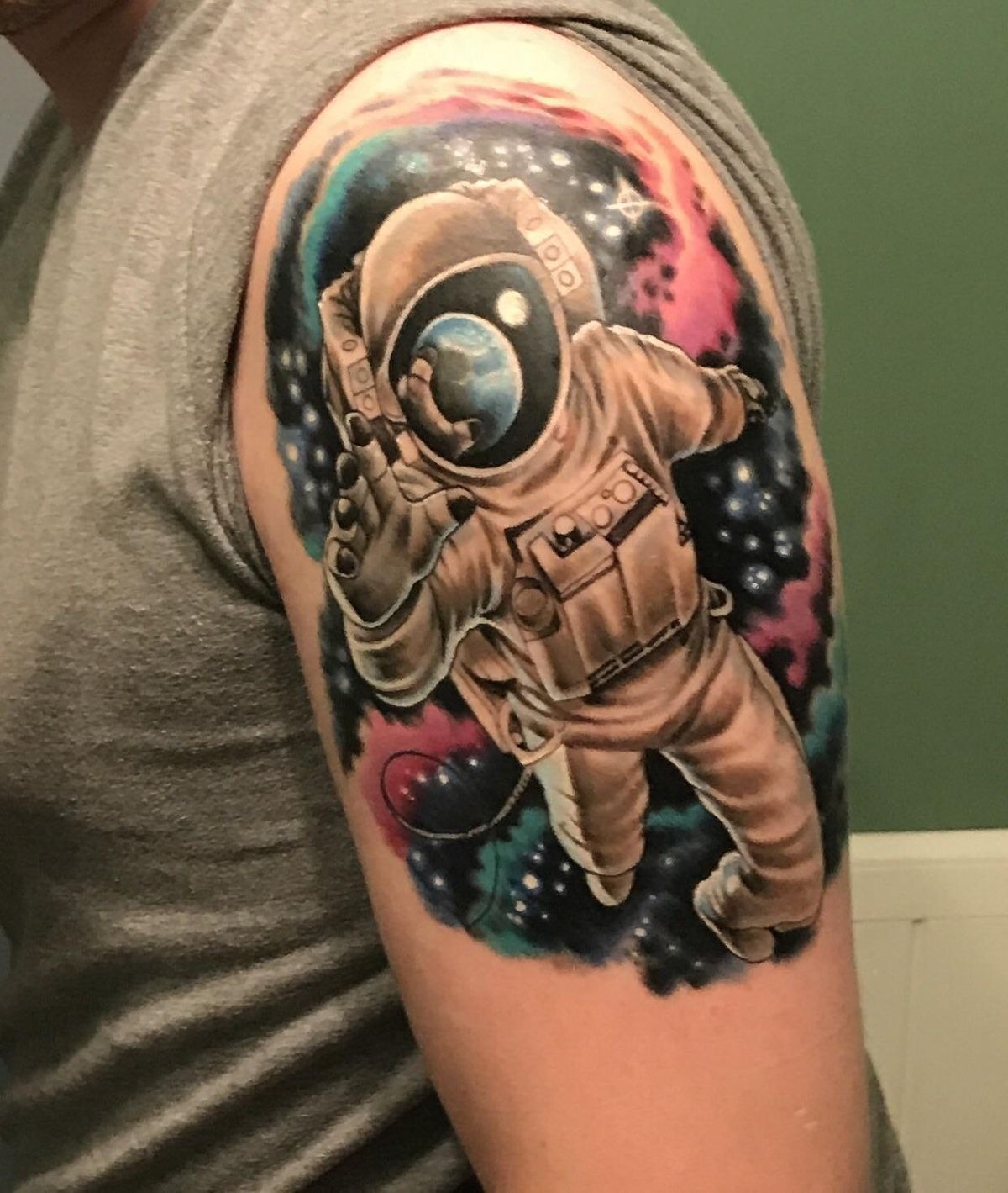 Realistic Astronaut with Birds Tattoo Design