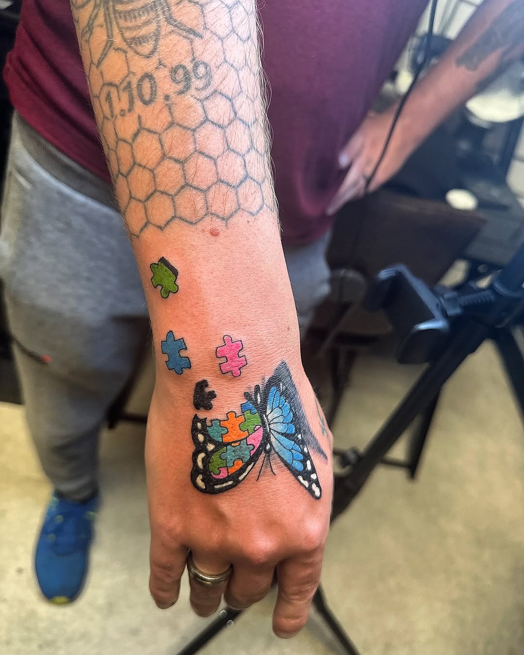 Colorful butterfly and puzzle piece tattoo design Tattoo Design