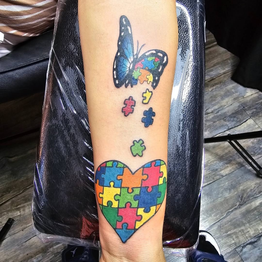 Vibrant Butterfly and Puzzle Heart Tattoo Tattoo Design