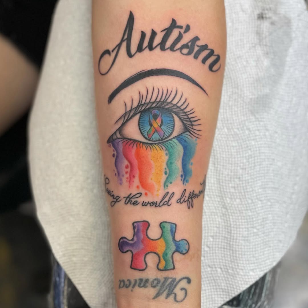 Vibrant Eye Tattoo Embracing Autism Awareness Tattoo Design
