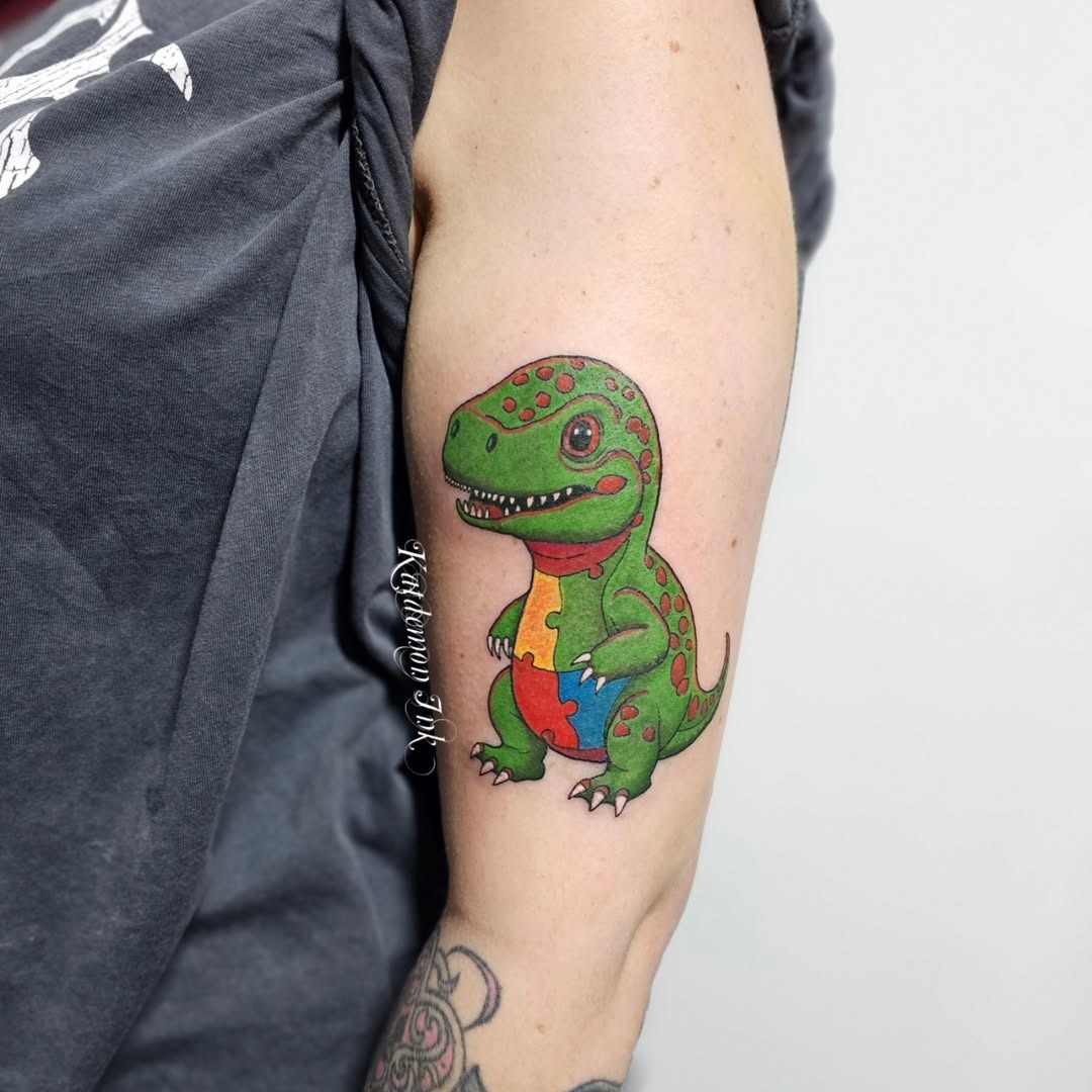 Vibrant lizard tattoo celebrating autism awareness Tattoo Design