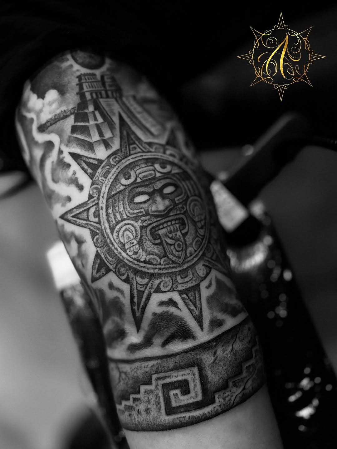Intricate Aztec sun tattoo with geometric patterns Tattoo Design