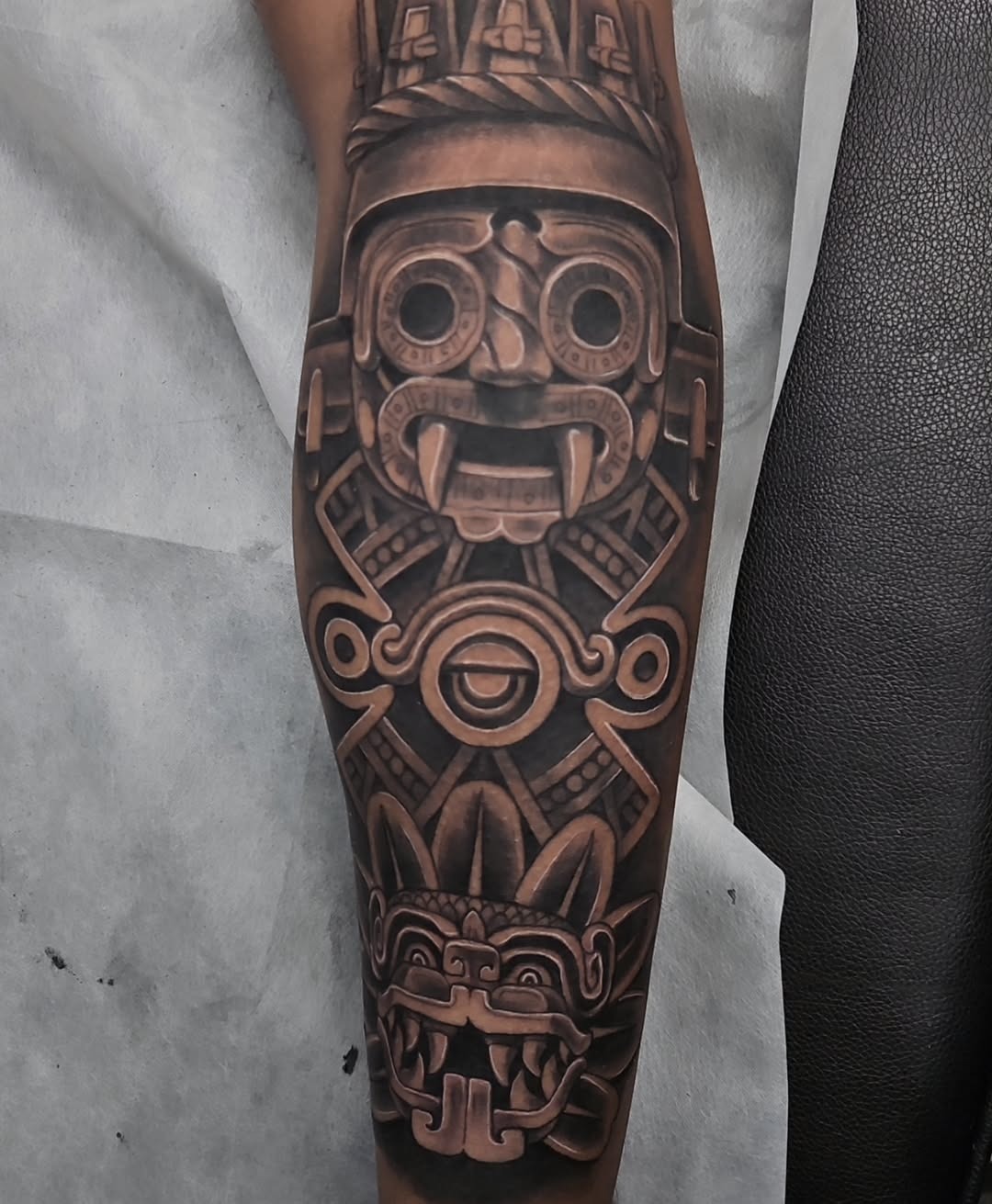 Intricate Aztec Tattoo with Iconic Motifs Tattoo Design
