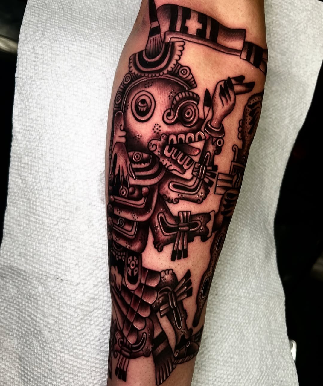 Intricate black and gray Aztec tattoo design Tattoo Design