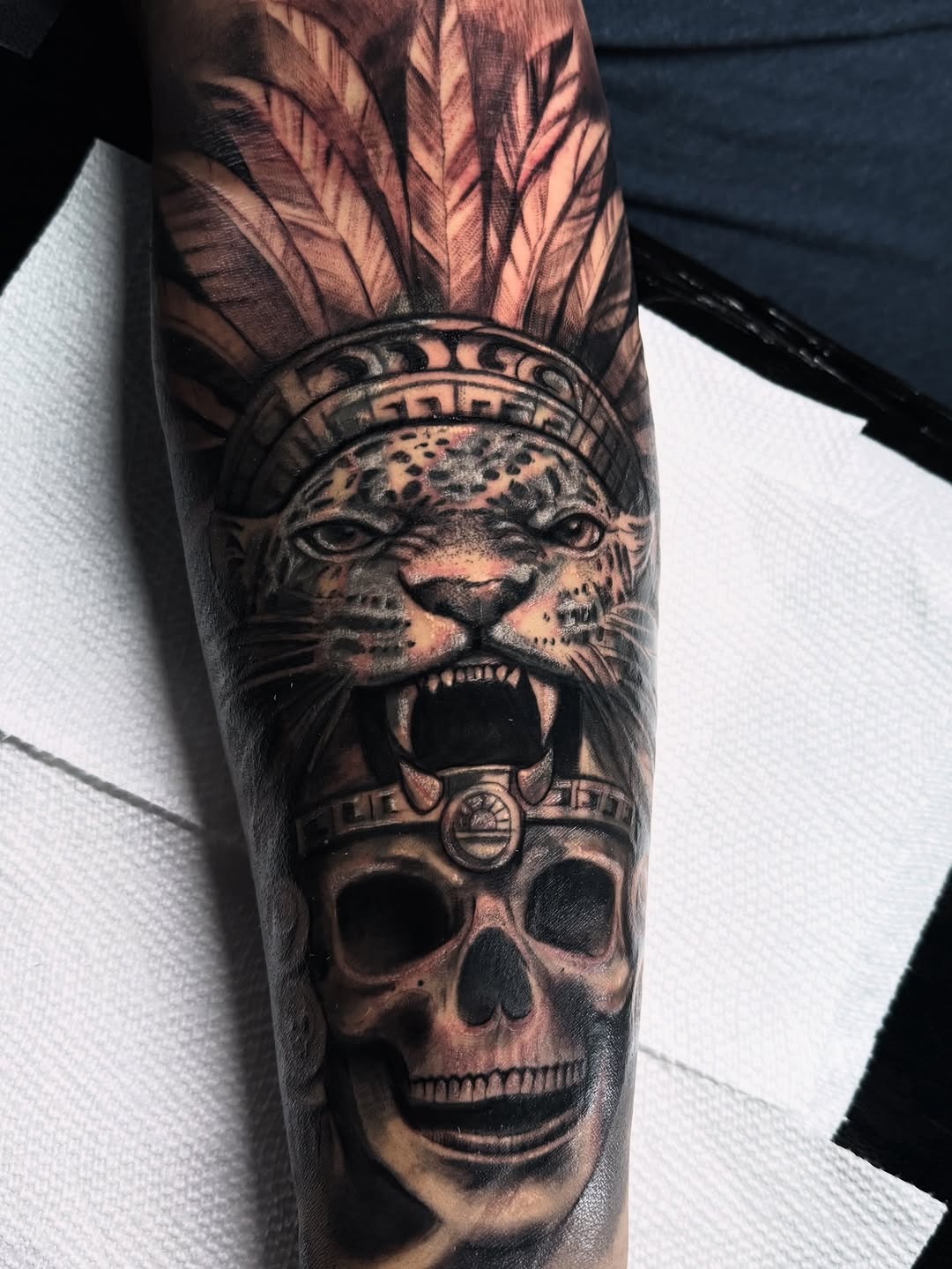 Powerful Aztec-inspired skull and jaguar tattoo Tattoo Design