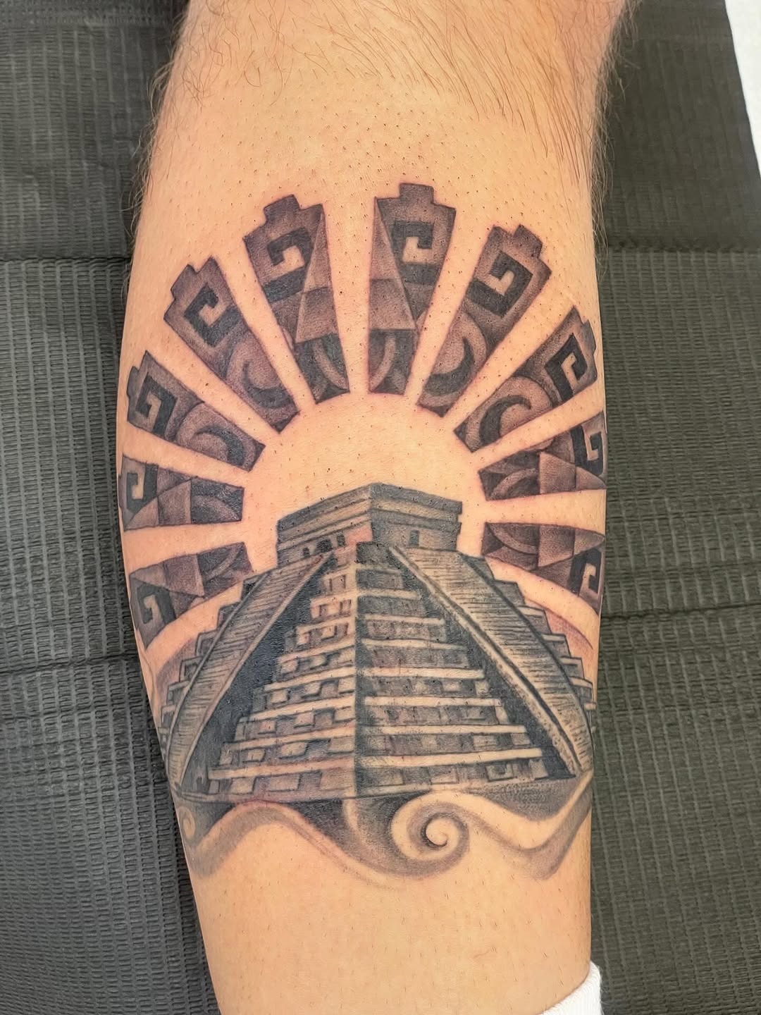 Stunning Aztec Pyramid Tattoo with Sun Rays Tattoo Design