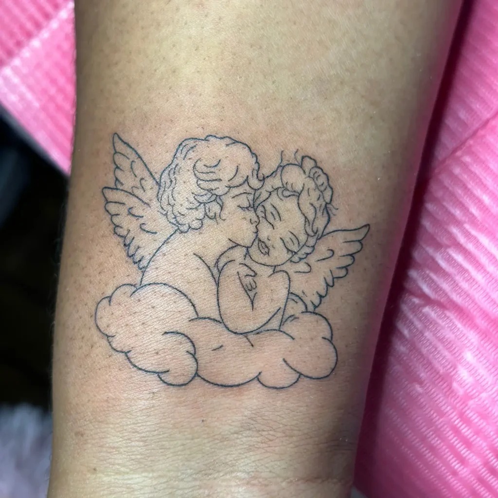 Embracing Cherubs on a Cloud Tattoo Design