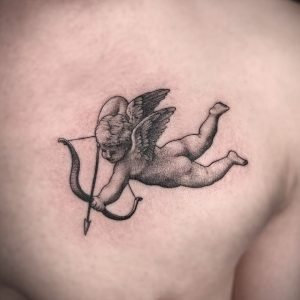 Minimalist Cupid in Motion Tattoo Design