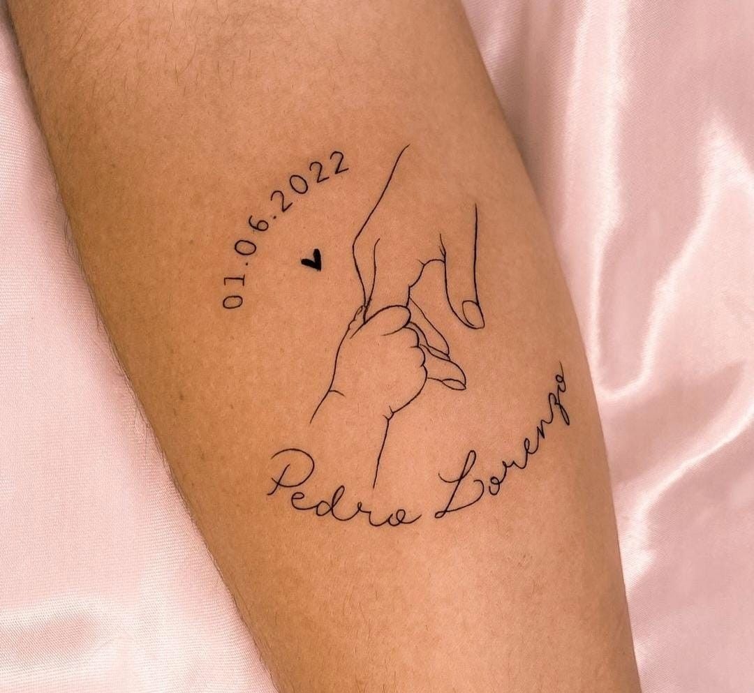 Minimal Baby Hand-Holding Tattoo For Mom Tattoo Design