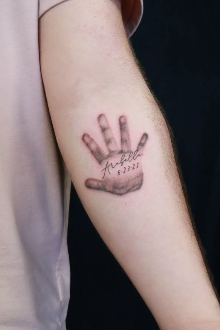 Soft Baby Handprint Tattoo With Name Tattoo Design