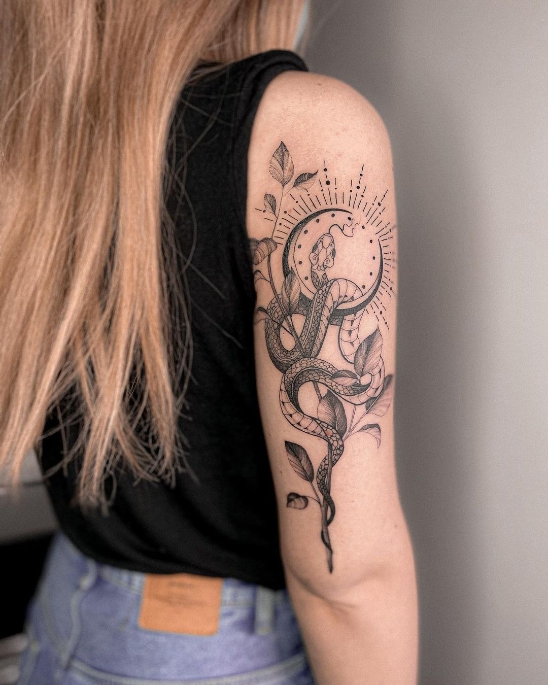 Floral Vase and Butterfly Back of Arm Tattoo Tattoo Design
