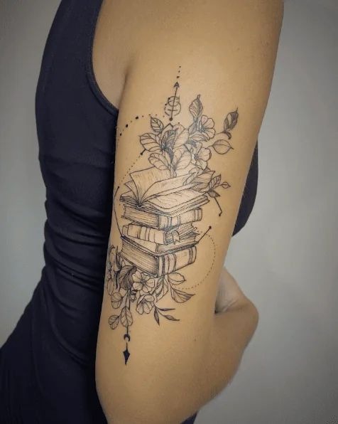 Hand Holding Flowers Back of Arm Tattoo Tattoo Design