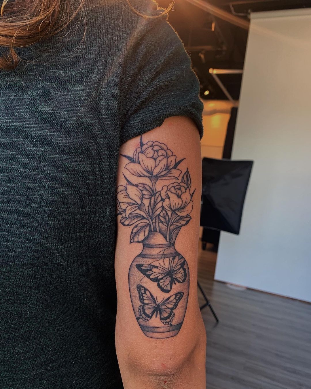 Light Bulb Floral Back of Arm Tattoo Tattoo Design
