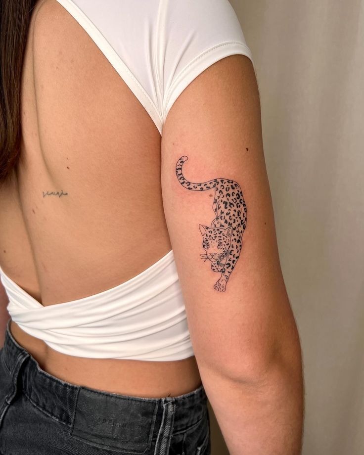 Snake and Sun Back of Arm Tattoo Tattoo Design