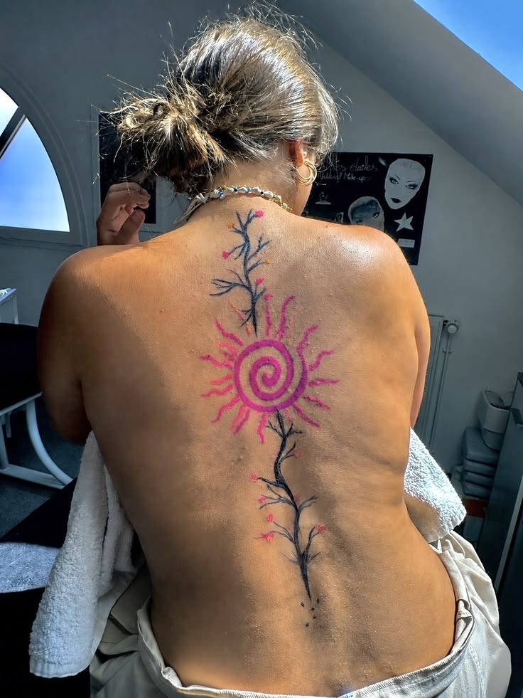 Pink Spiral Sun And Branch Spine Tattoo Tattoo Design