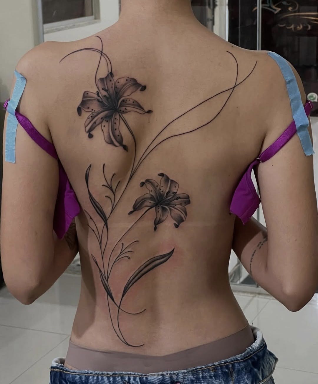 Smoky Lily Side-Back Tattoo Tattoo Design