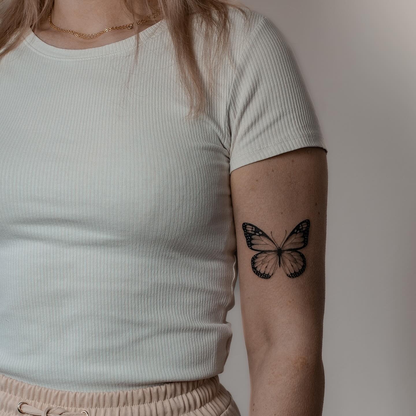 Minimalist Butterfly Arm Tattoo Tattoo Design