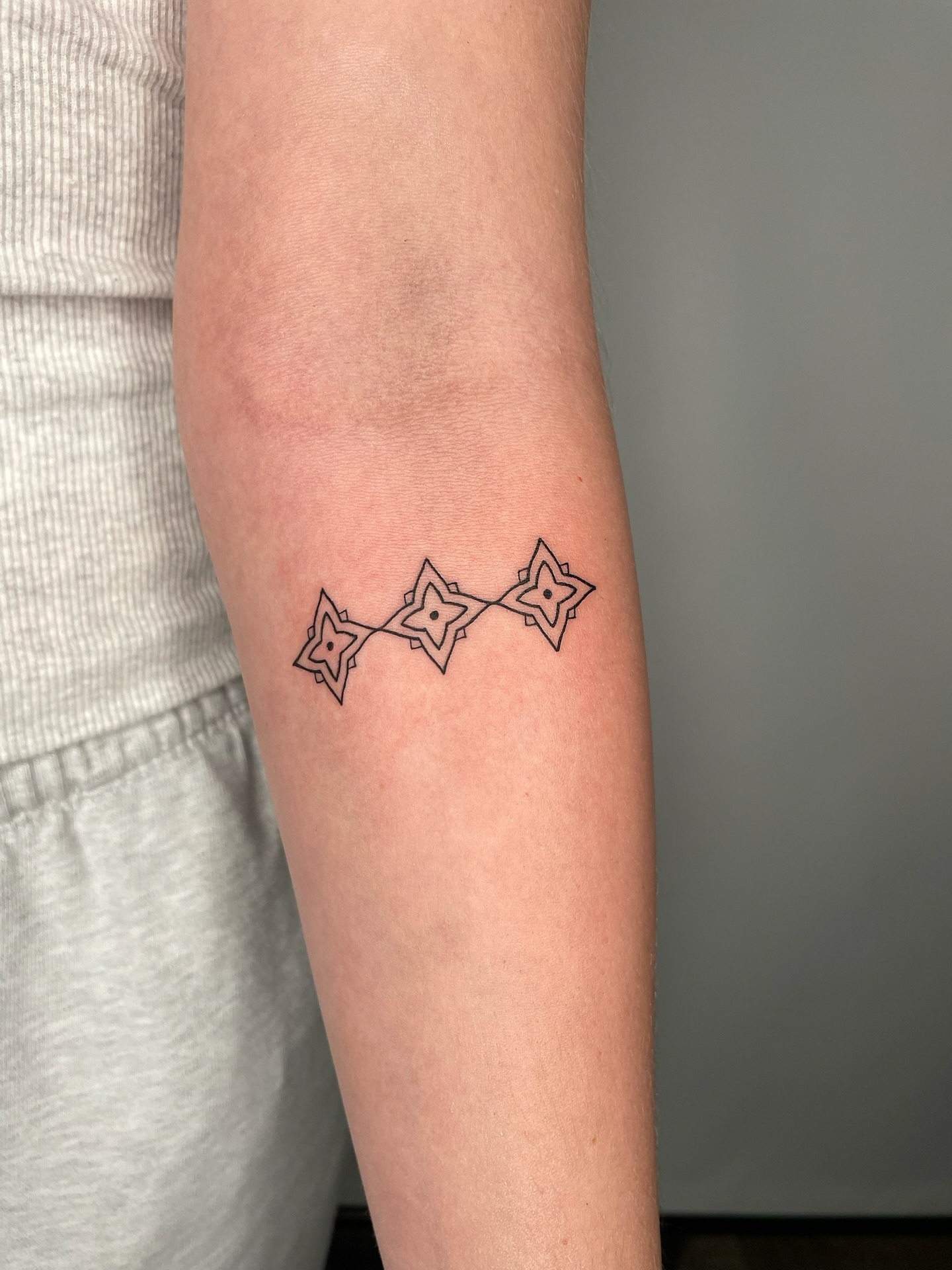 Minimalist Star Chain Arm Tattoo Tattoo Design