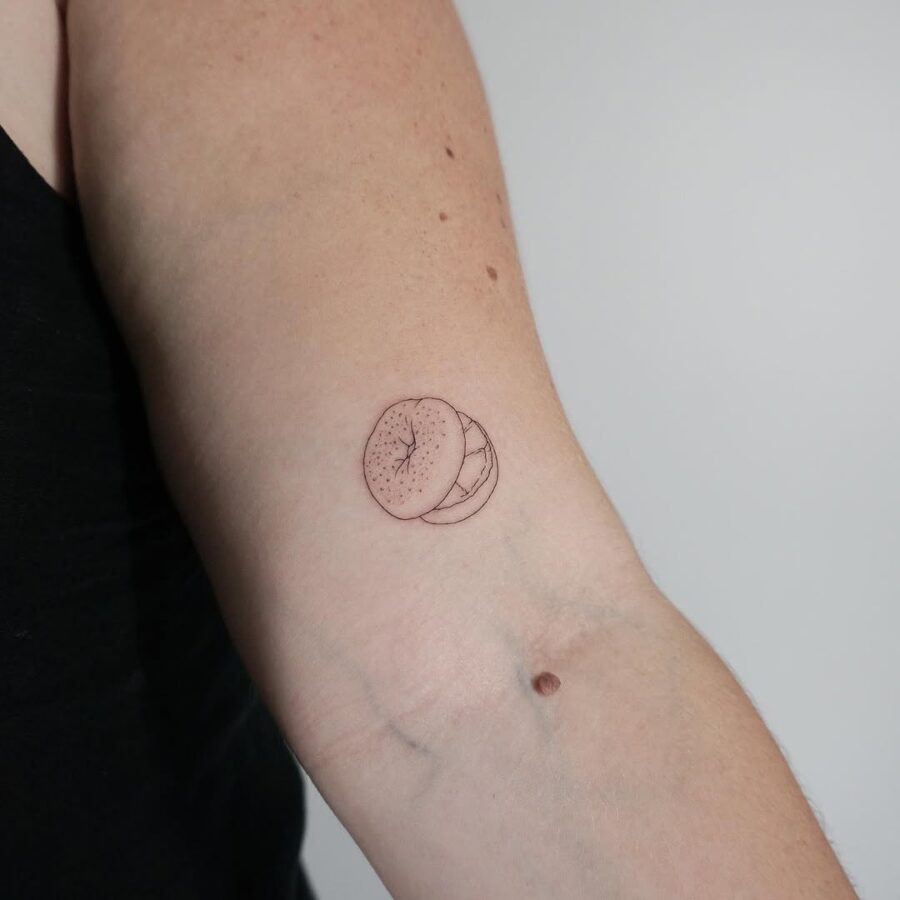 Charming bagel tattoo in a minimal style Tattoo Design
