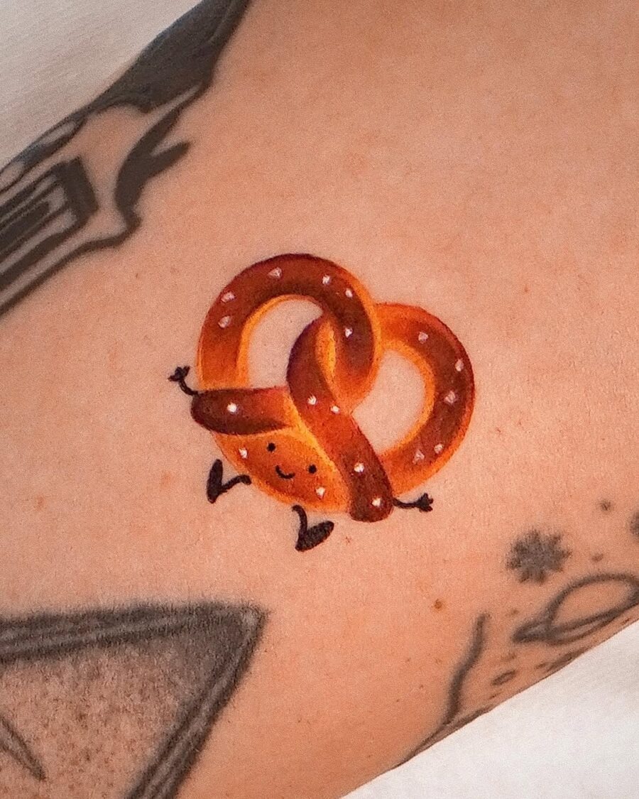 Charming pretzel tattoo with playful design Tattoo Design