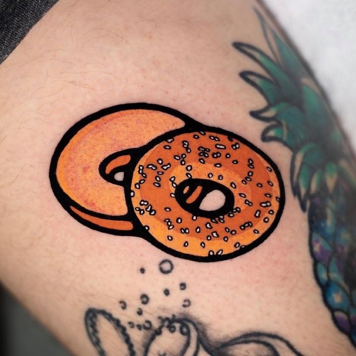 Colorful Bagels Inked in Playful Style Tattoo Design
