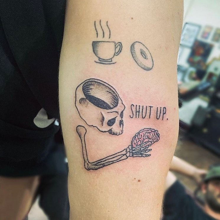 Unique skull and bagel tattoo design Tattoo Design