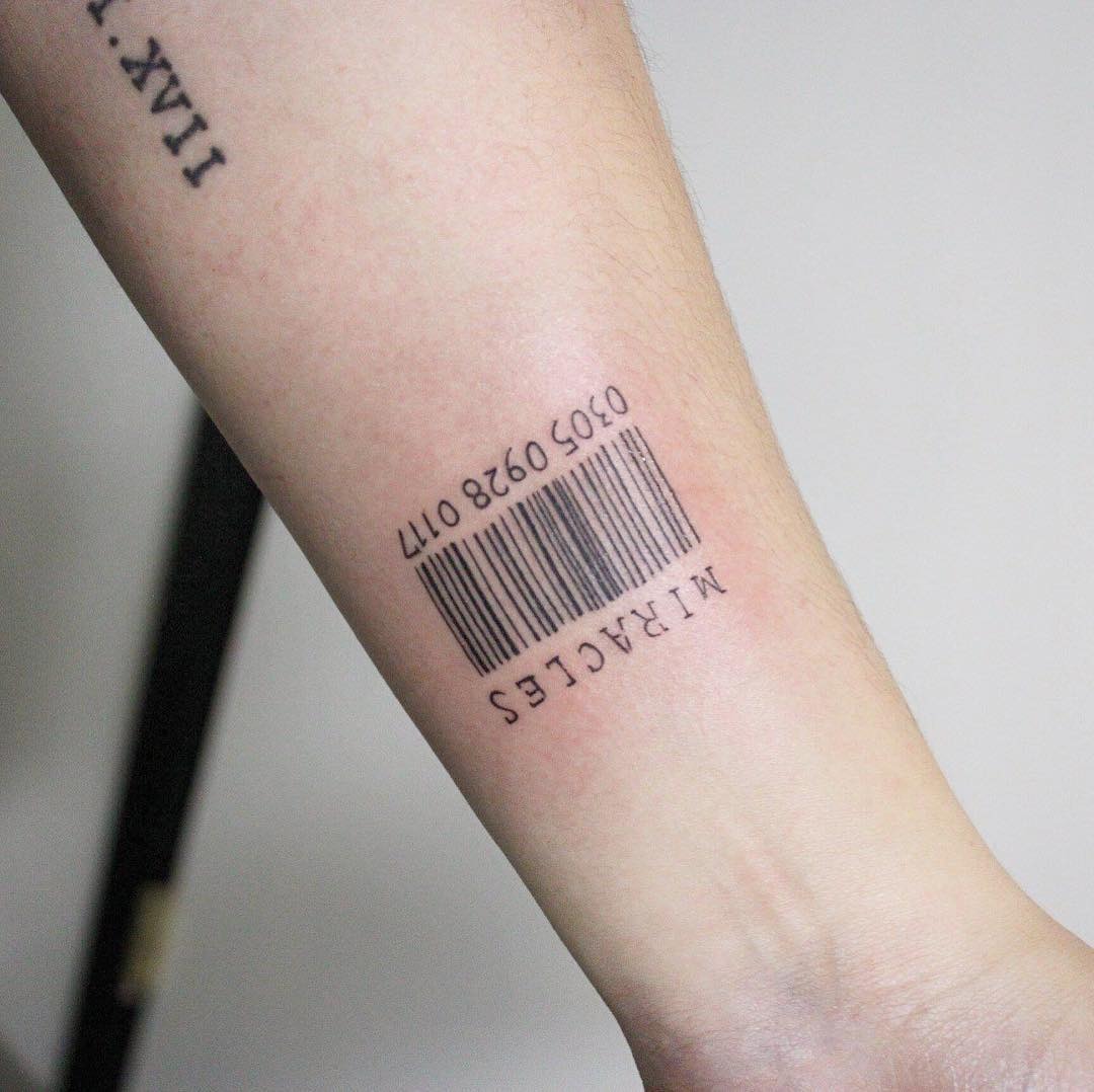 This barcode tattoo combines minimalism with personal expression.