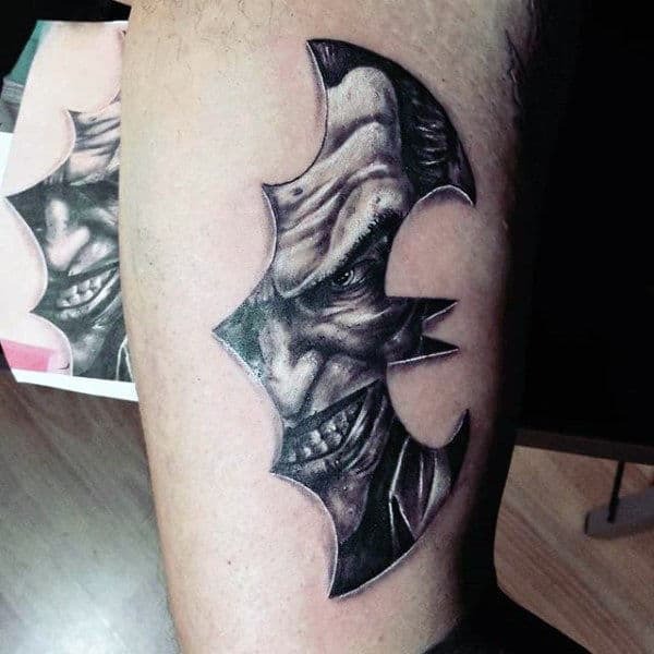 The Joker in a Menacing 3-D Logo with ThrowingStar TattooBatman Tattoos Tattoo Design