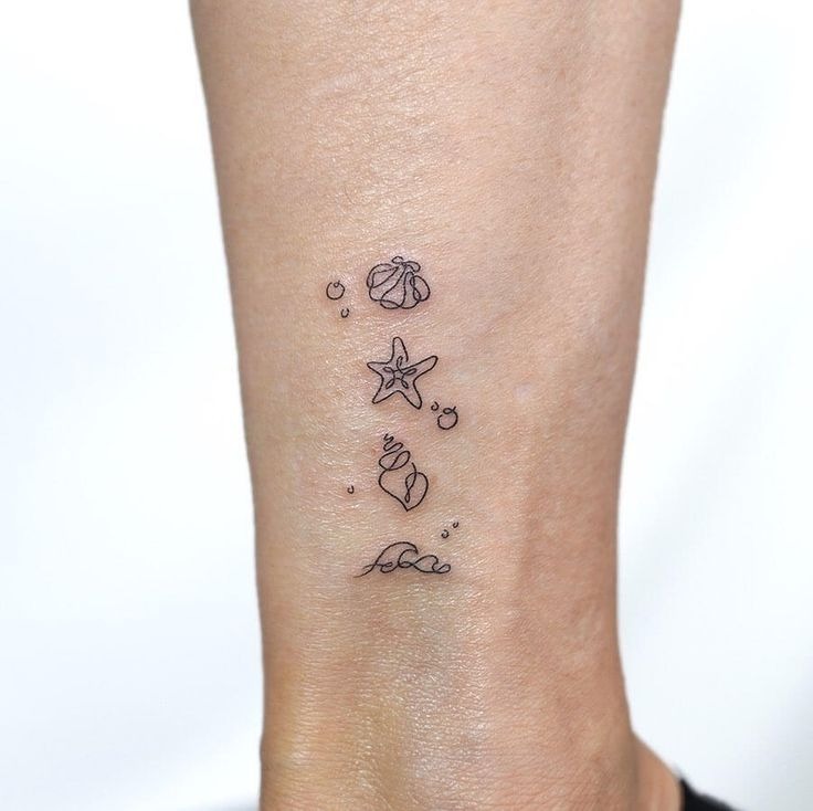 Sea Creatures and Shells Line Design Tattoo Design