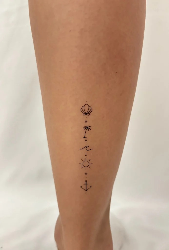 Vertical Beach Symbols Tattoo Design