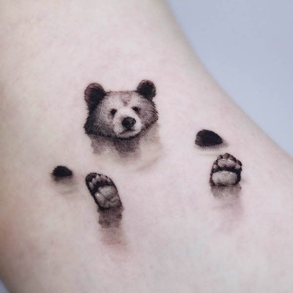 Tiny Cub Illusion in 3D Tattoo Design