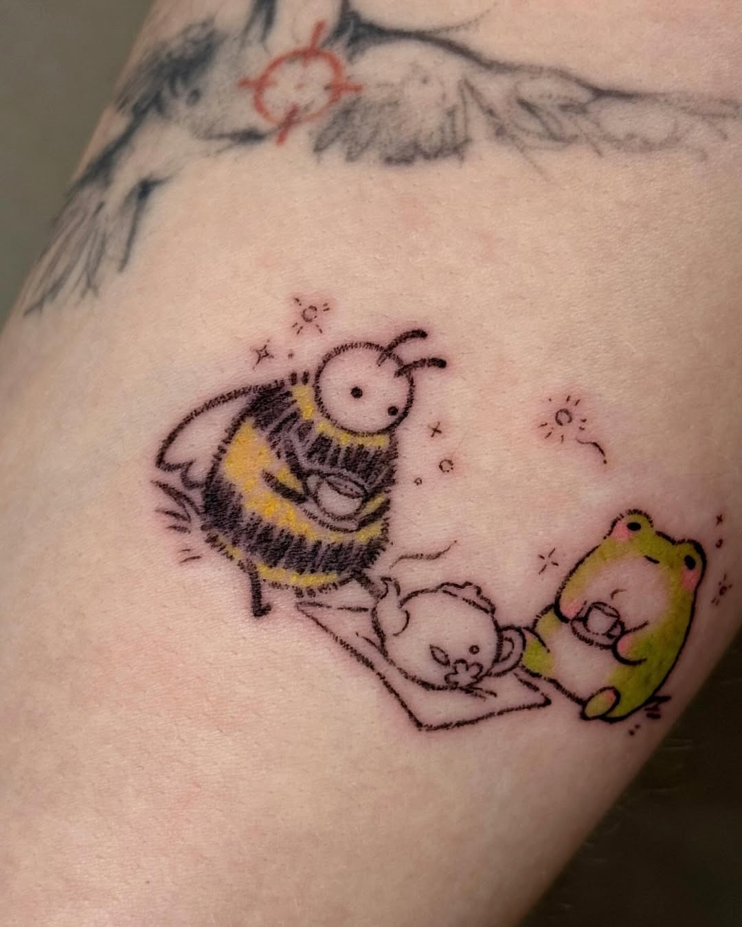 Charming cartoon bee and frog tattoo design Tattoo Design