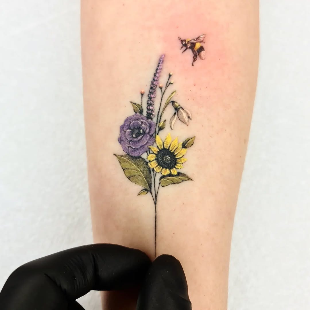 Charming floral bee tattoo with vibrant colors Tattoo Design