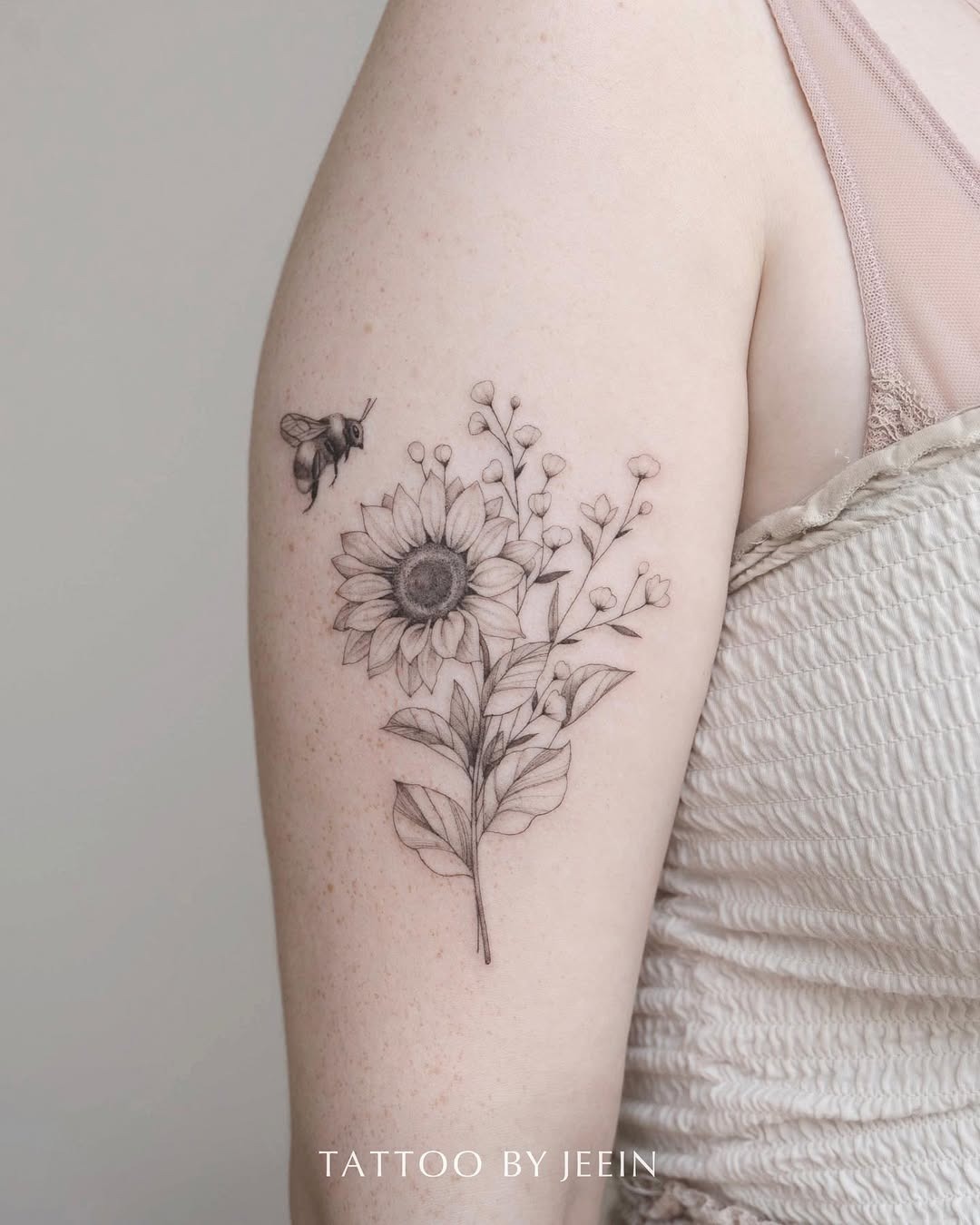 Elegant Minimalist Bee and Flower Tattoo Design Tattoo Design