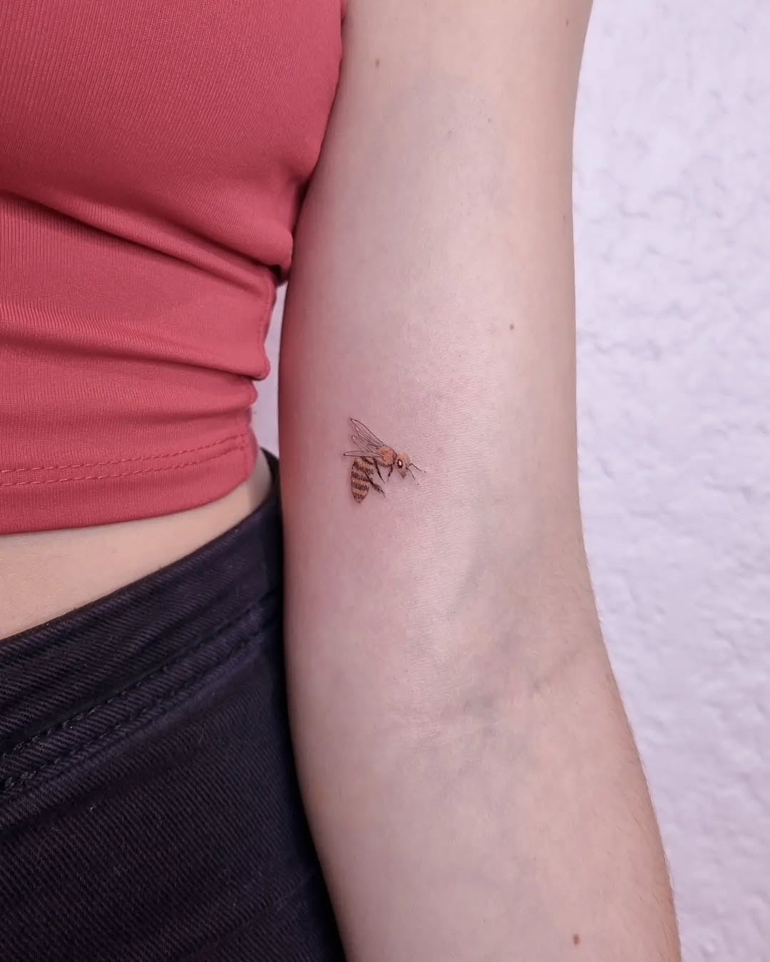 Realistic Bee Tattoo on Inner Arm Tattoo Design