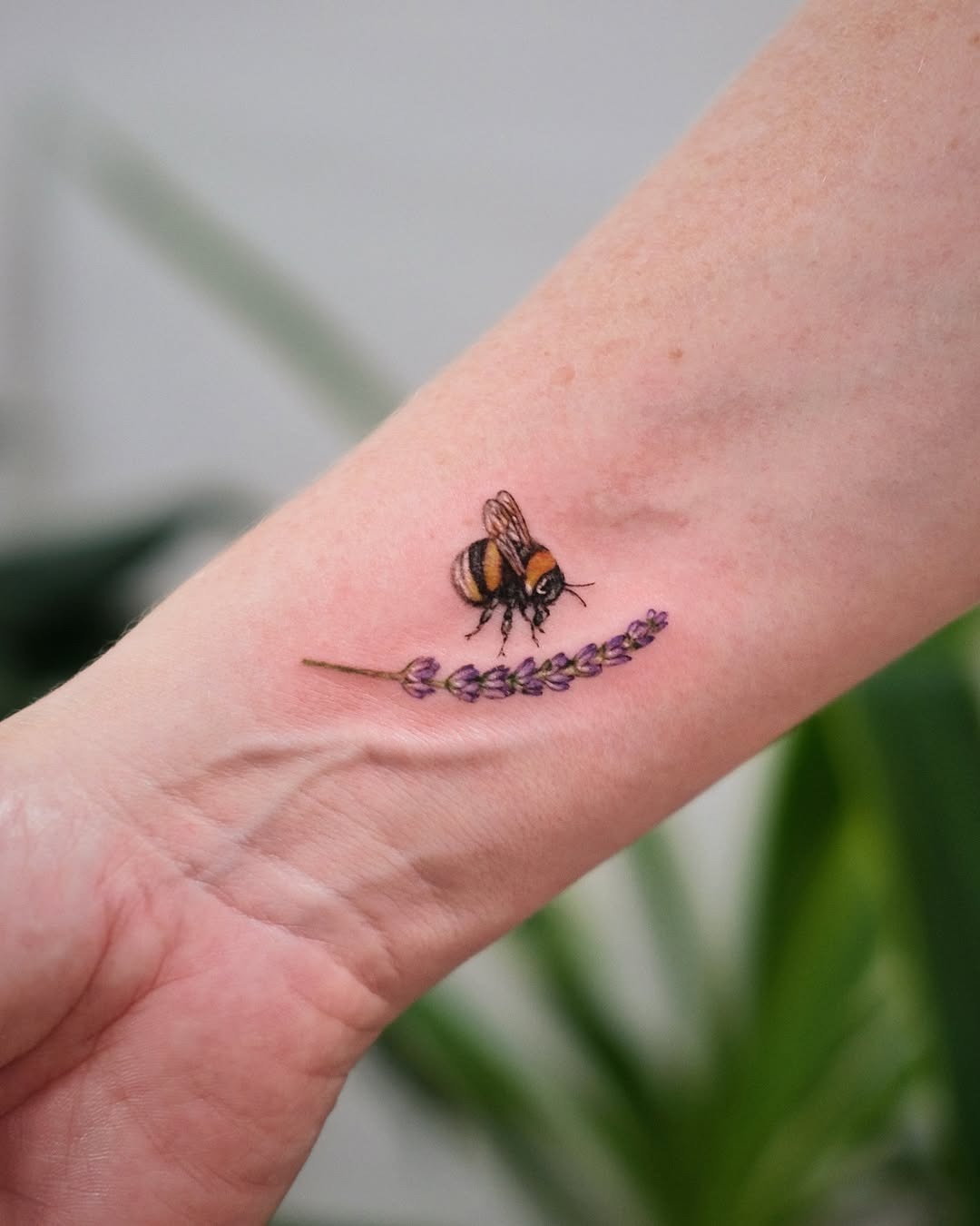 Stunning bee tattoo with lavender accent Tattoo Design