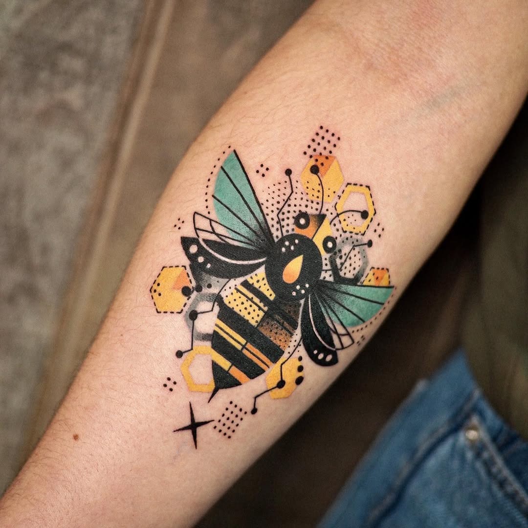 Stunning geometric bee tattoo with color accents Tattoo Design