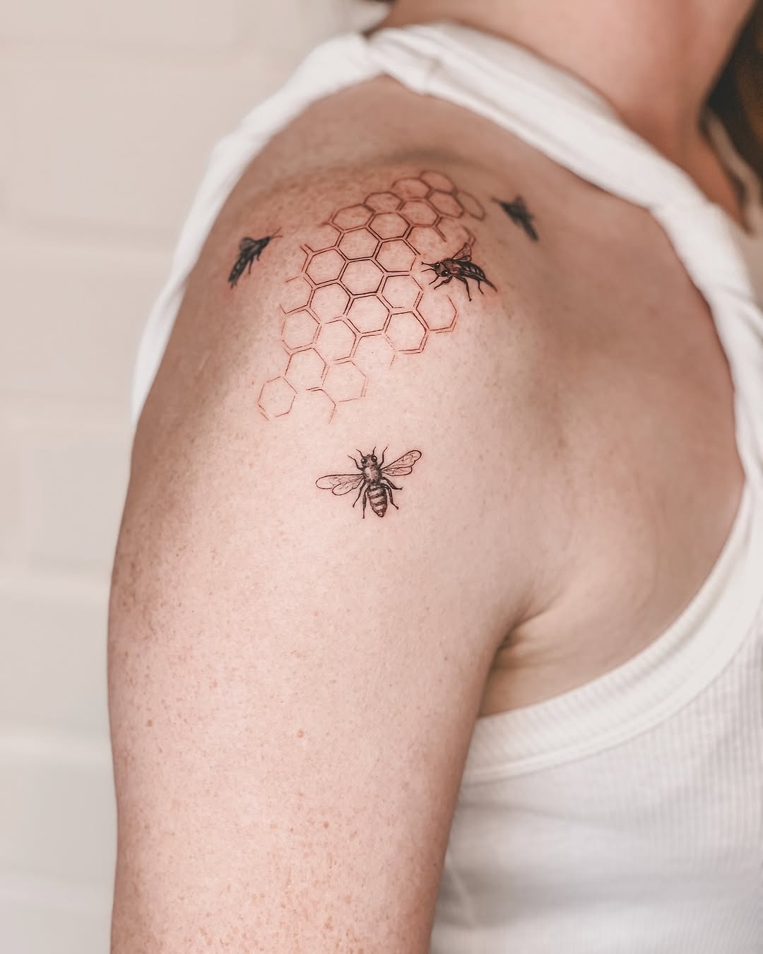 Stunning honeycomb and bee tattoo art Tattoo Design