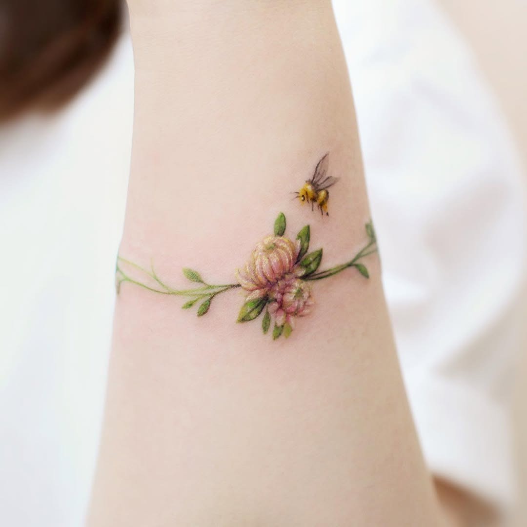Stunning watercolor bee and floral tattoo design Tattoo Design