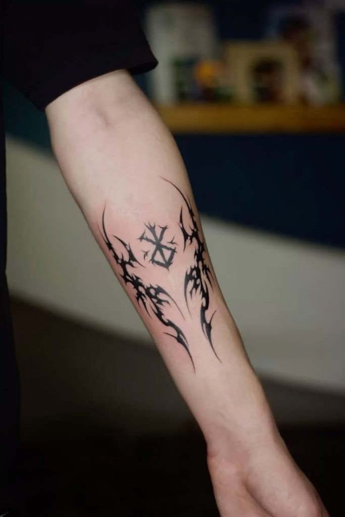 Dark Tribal Brand of Sacrifice Forearm Tattoo Tattoo Design
