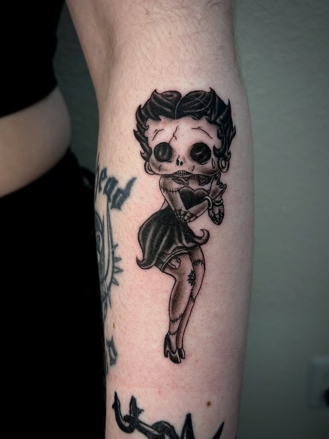 Charming Betty Boop Tattoo with Gothic Flair Tattoo Design