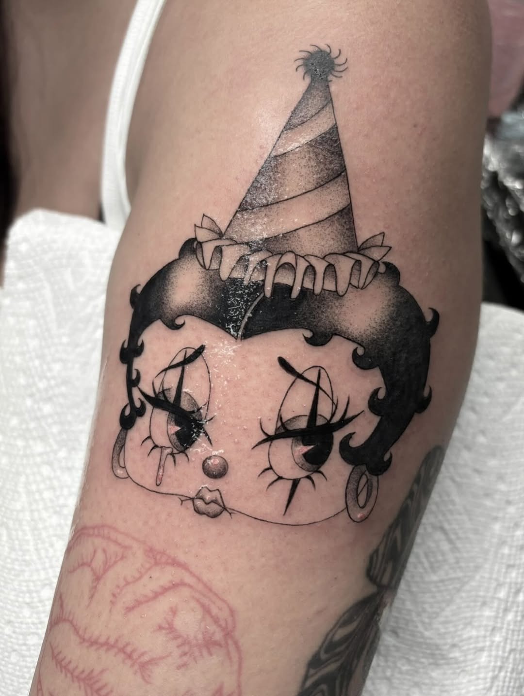 Charming Betty Boop Tattoo with Party Vibes Tattoo Design