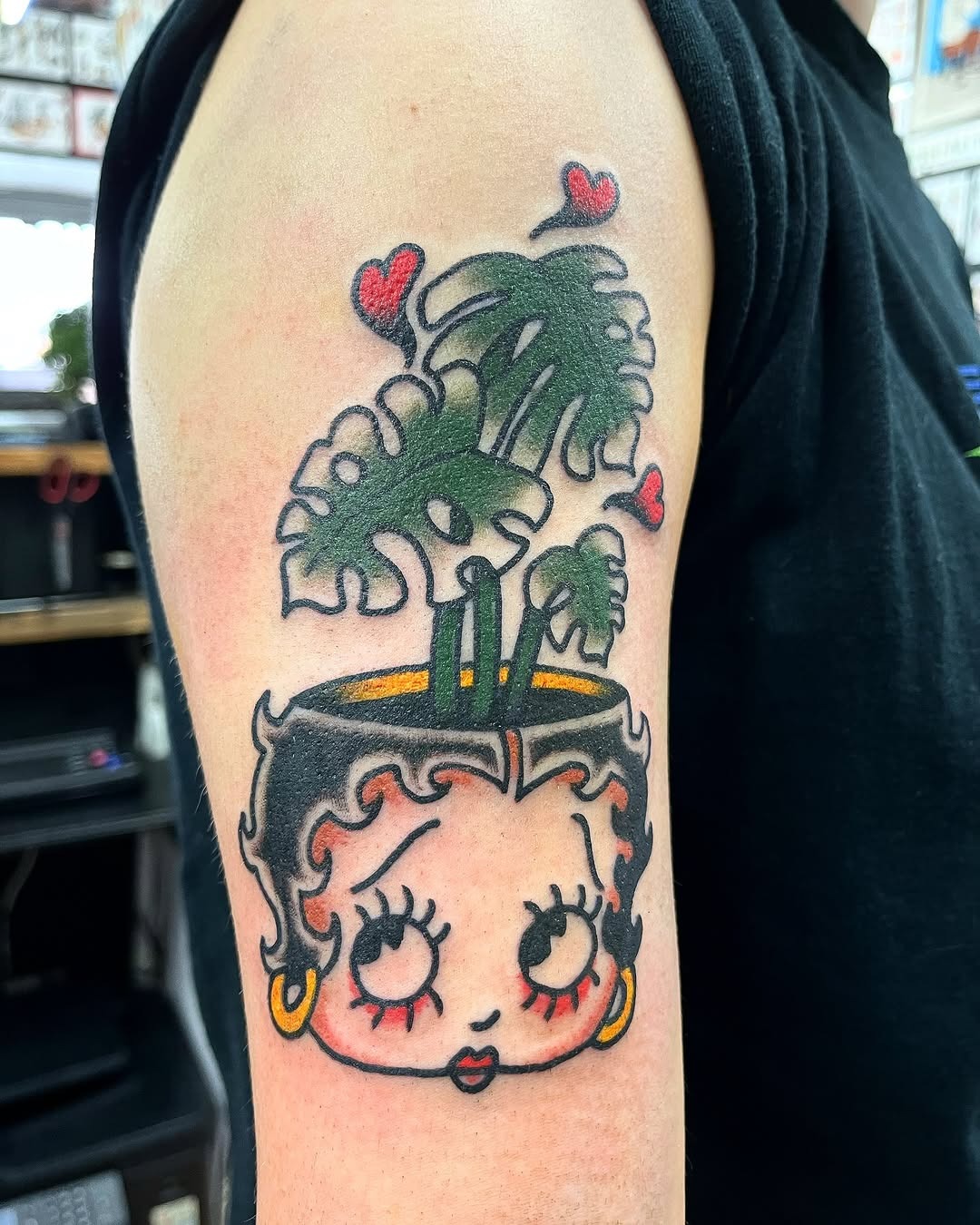 Playful Betty Boop Plant Tattoo Design Tattoo Design