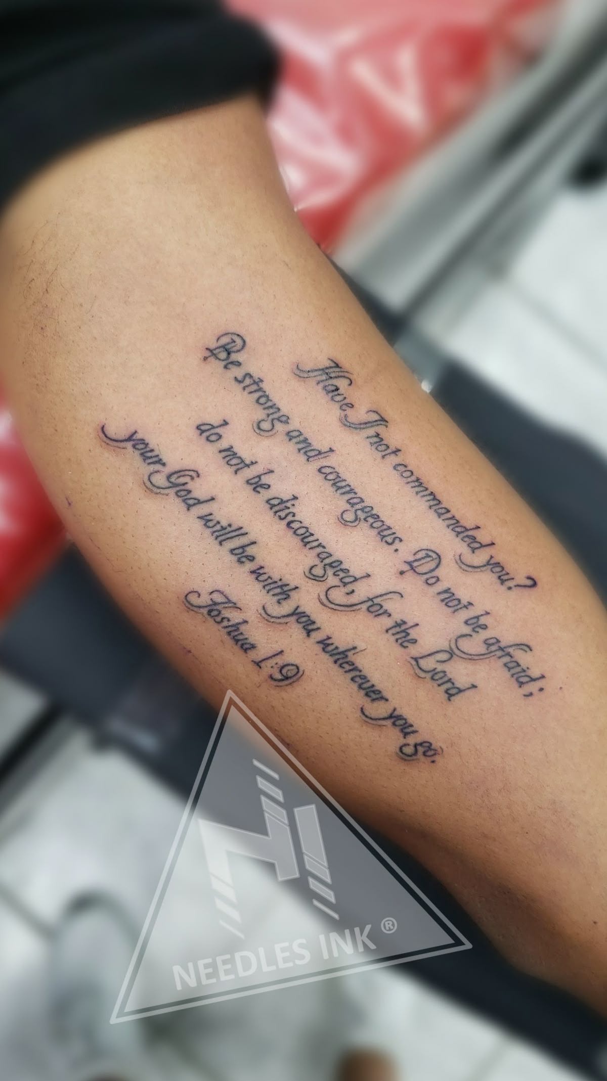 Arm tattoo of Joshua 1:9, a tattoo design rendered in clean detailed linework for the leg.