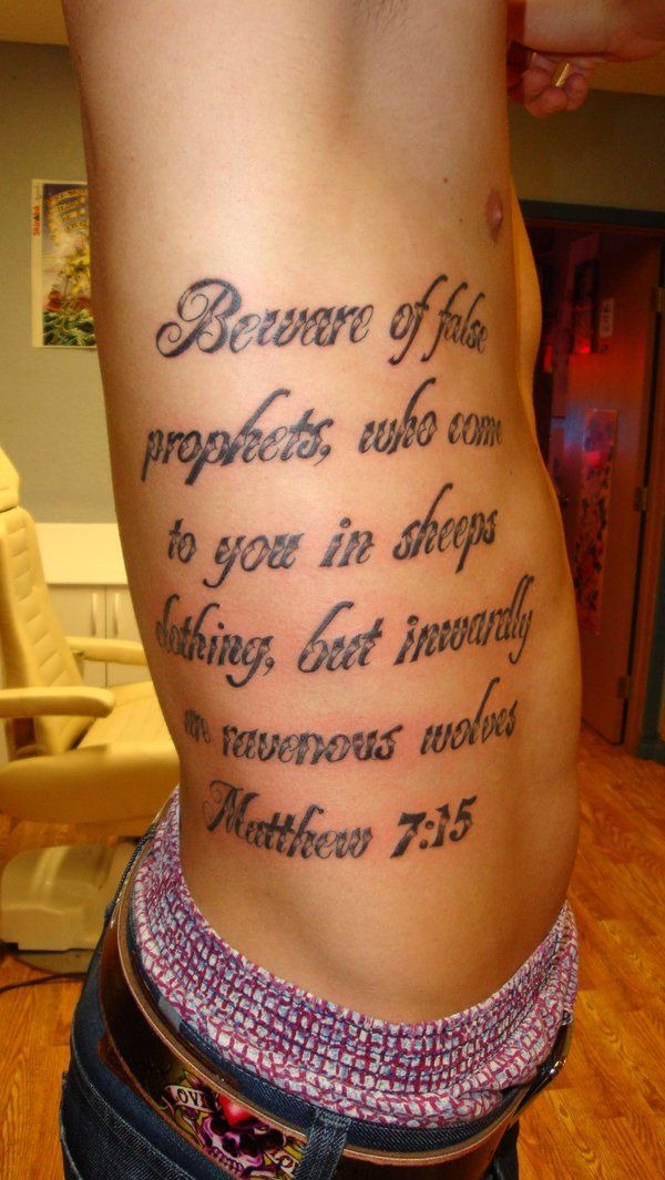 Matthew 7:15 Rib Tattoo, a tattoo design rendered in bold.