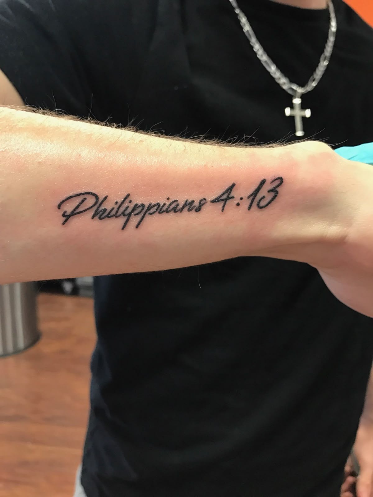 Philippians 4:13-The Forearm Tattoo, a tattoo design rendered in bold.