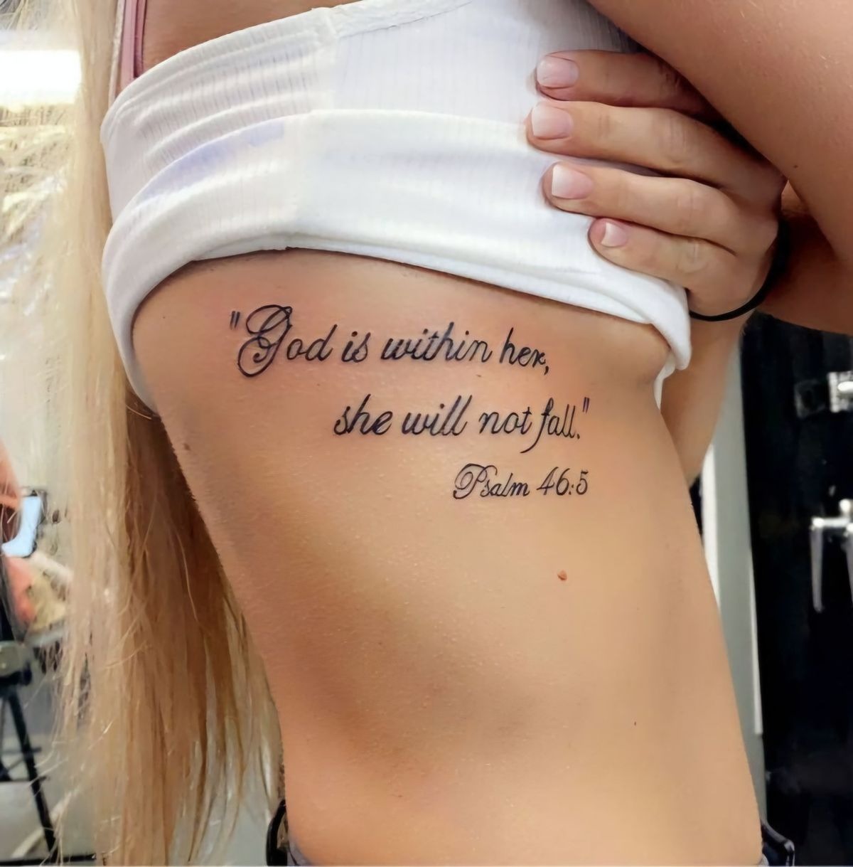 Psalm 46:5 Rib Tattoo, a tattoo design rendered in clean detailed linework.