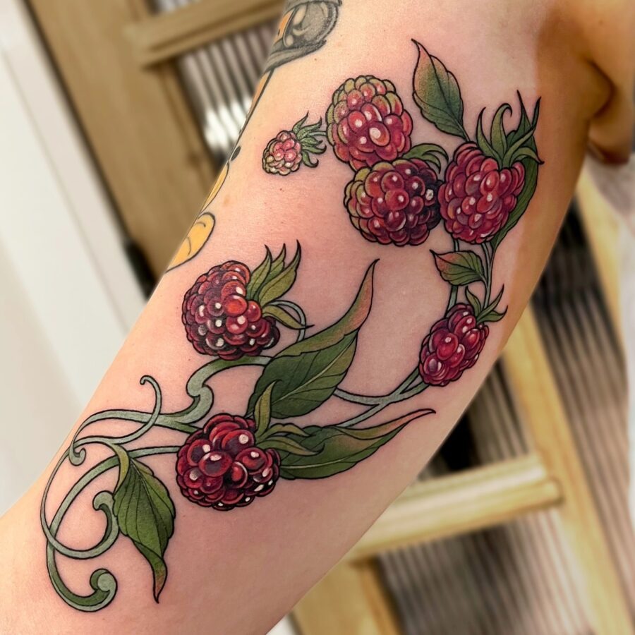 A vibrant berry tattoo for arm expression Tattoo Design